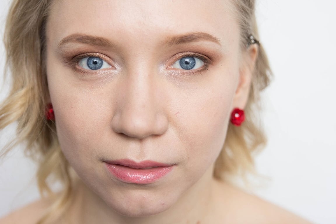 AI red eye remover after transformation - studio shot with clean realistic eyes