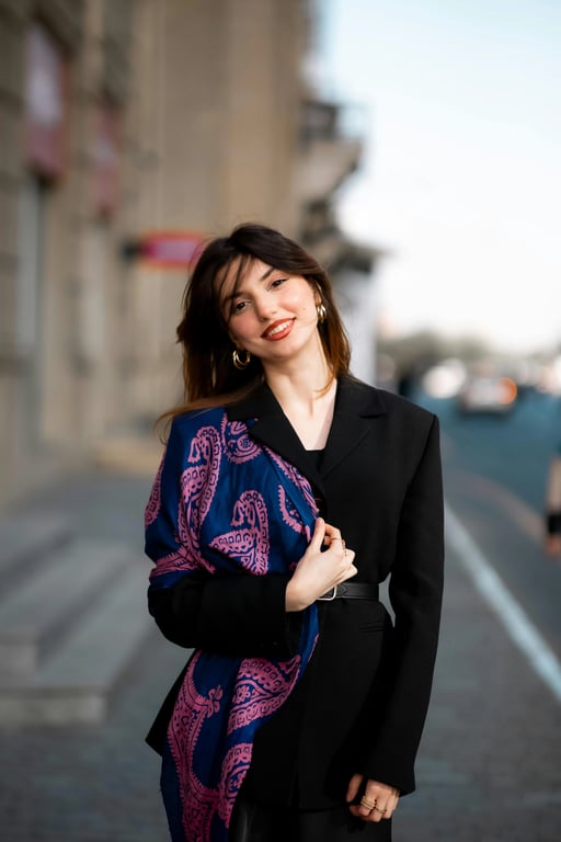 a portrait of a person reimagined in a modern Japanese illustration style with simplified but expressive facial features, smooth clean line art, soft but intentional color blocks, light shading, and a refined contemporary Japanese graphic look