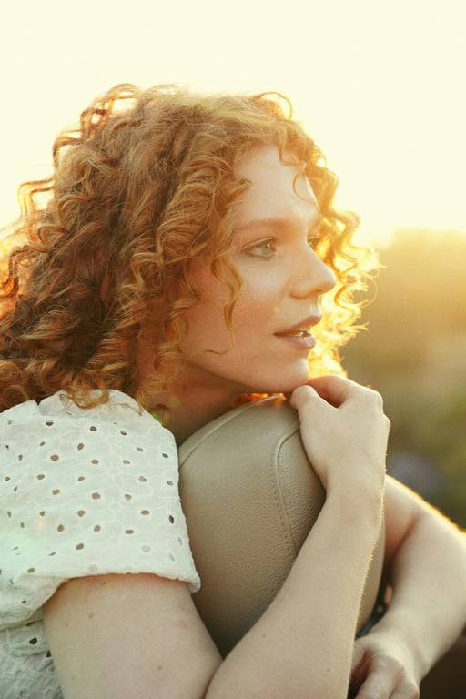 a portrait of a person styled as a clean Polaroid instant image with gentle color shifts and subtle film texture