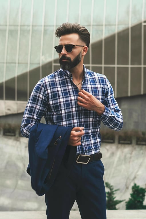 a portrait of a person refined to show increased hair volume through controlled density enhancement and root lift; preserve haircut structure and length; keep individual strands visible; avoid smoothing or over-styling; do not modify background, face, or posture; result should look like healthy, naturally thick hair