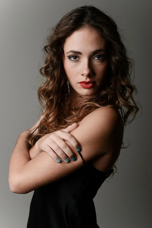 a portrait of a person enhanced with modern aesthetic outfit styling, harmonious colors, stylish layered clothing, confident relaxed pose, smooth lighting, and a minimal fashionable backdrop