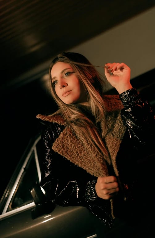 a portrait of a person transformed into a Demon Slayer–inspired anime artwork with bold outlines, textured shading, flowing garment shapes, and intense anime lighting