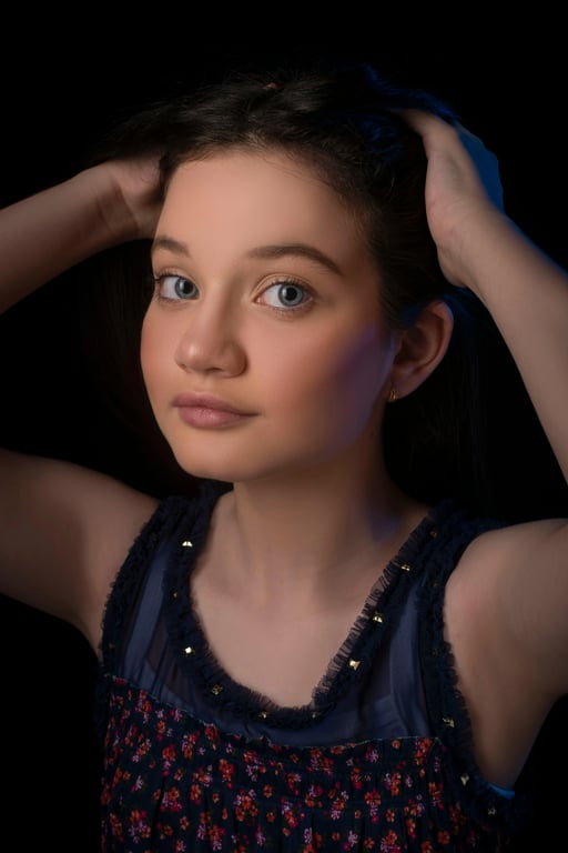 a portrait of a person edited into a dramatic magical girl transformation scene, showcasing a fully revealed magical uniform with bow details, pleated skirt, gloves, boots, strong glow effects, and fantasy symbolism