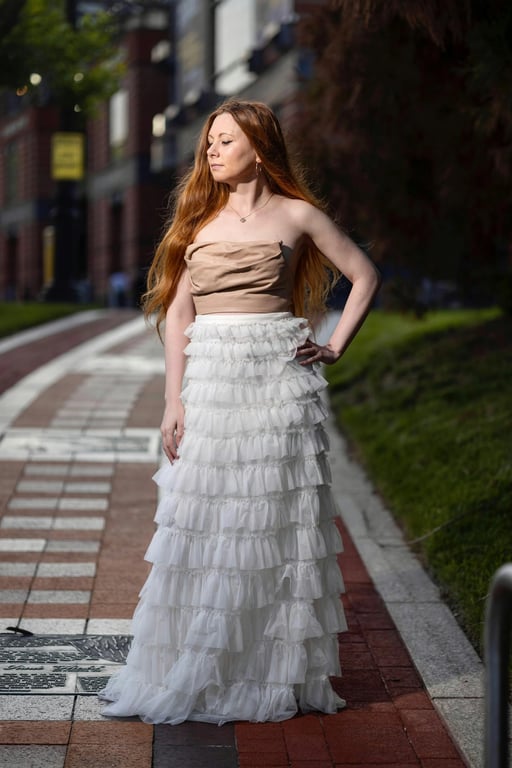 a portrait of a person transformed into an Attack on Titan–inspired anime illustration with realistic anime proportions, sharp angular facial features, muted earthy color palette, heavy shadowing, textured shading, and a serious war-like atmosphere