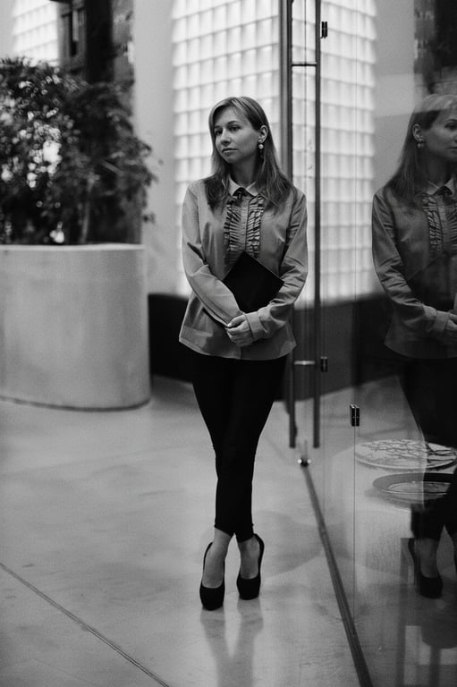 A street scene transformed to mimic 1960s street photography, with a grainy yet sharp texture, deep blacks, and a focus on candid, everyday moments.