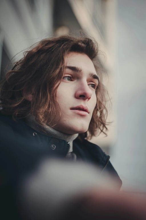 a portrait of a person reimagined in a tribal-inspired Native American art style with patterned elements integrated into clothing or background, stylized facial proportions, flat graphic composition, symbolic shapes, and balanced decorative structure