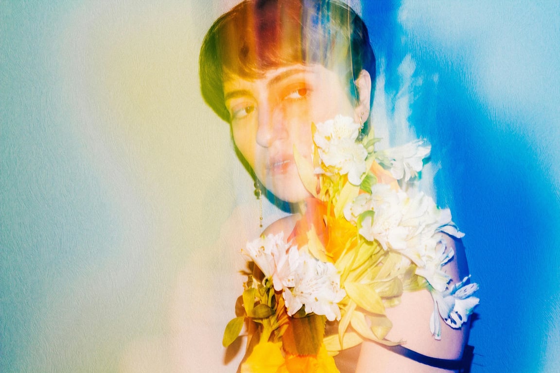 a portrait of a person restored with controlled light cleanup, keeping face highlights and shadows natural while removing chaotic light interference