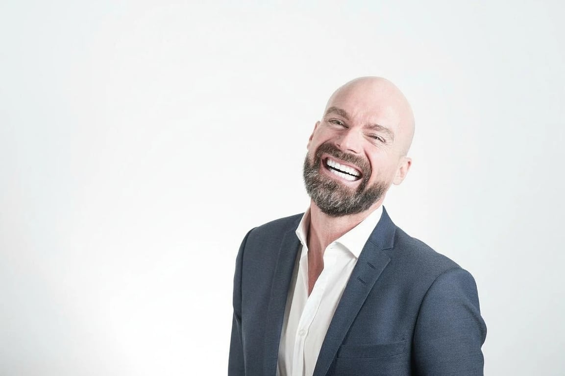 AI teeth whitening filter after photo - businessman in suit smiling with teeth visibly whitened