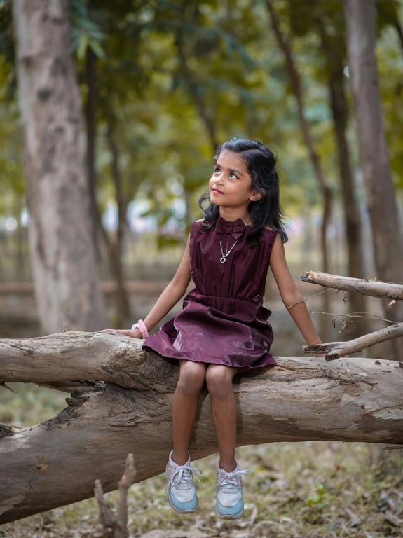 a portrait of a person edited into a sparkling magical girl transformation moment, featuring a structured magical uniform with a fitted top, decorative brooch, layered skirt, arm-length gloves, tall boots, flowing ribbons, anime motion lines, and a clean fantasy background