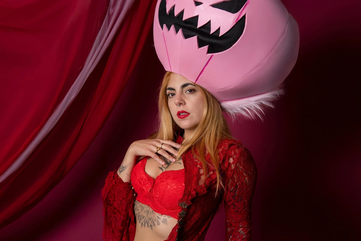 AI ugly filter before photo-woman with a pink pumpkin