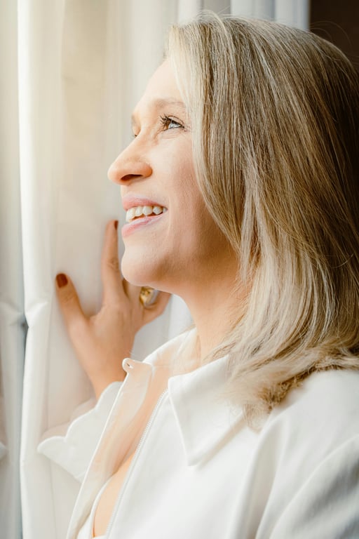 a portrait with a comprehensive eye area enhancement, combining bag removal, slight lift effect, and overall skin tone unification