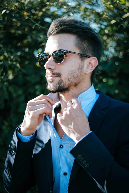 a portrait of a person styled with expressive fashion details, refined tones, confident posture, clean lighting, and uncluttered setting，make it more fashionable and incorporate unique, eye-catching characteristics