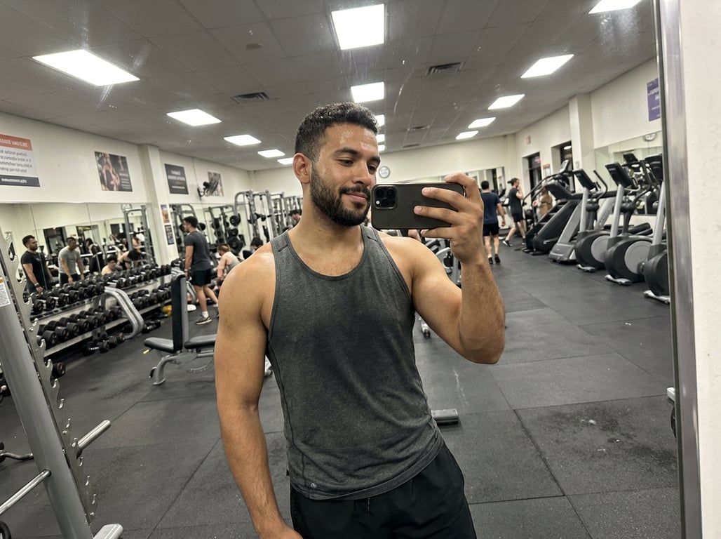 Turn this busy gym mirror snap...