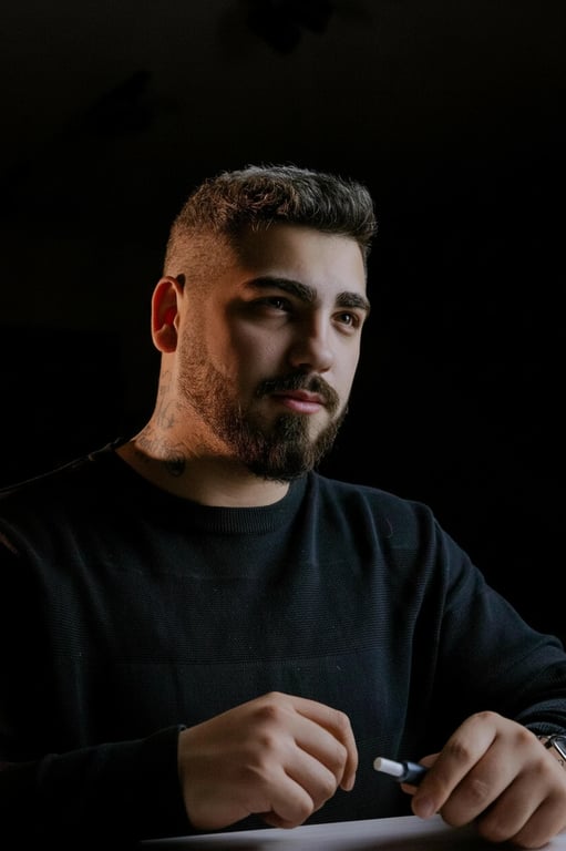 a portrait of a person edited to change the face shape from a round or wide appearance into a sharp V-shaped face, significantly narrowing the jaw and lower cheeks, pulling both sides inward to form a pointed chin shape, keeping forehead width unchanged, eyes nose and mouth in the same position, with a clearly visible before-and-after difference