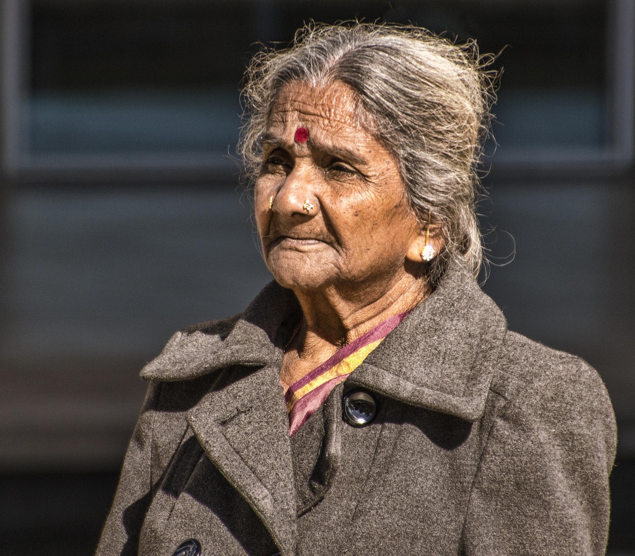 AI wrinkle remover filter before photo - close up face photo showing aging signs