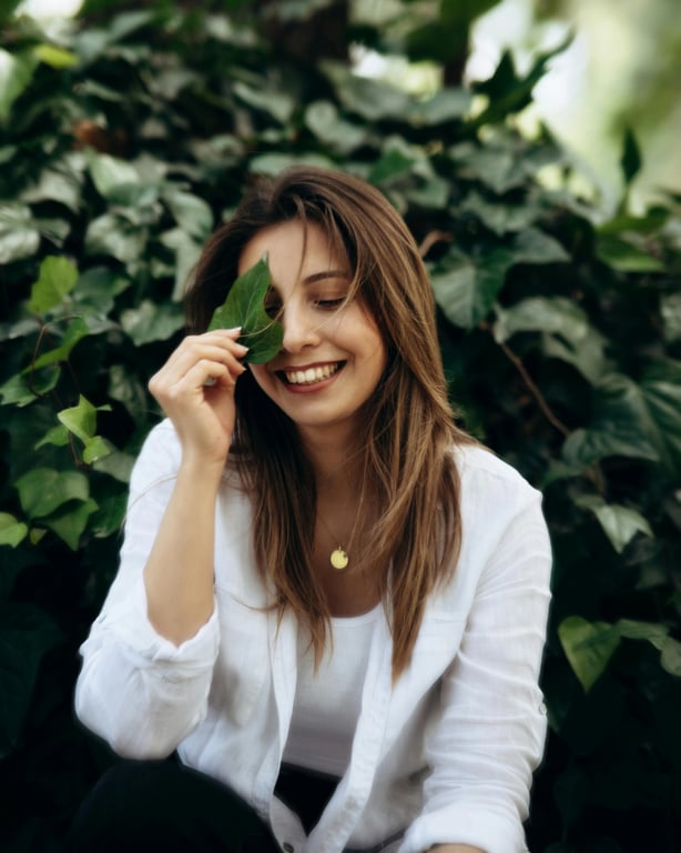 a French braided hairstyle with neat, structured braids starting from the scalp, tight along the length, and smooth, seamless transitions at the ends for a clean, elegant appearance