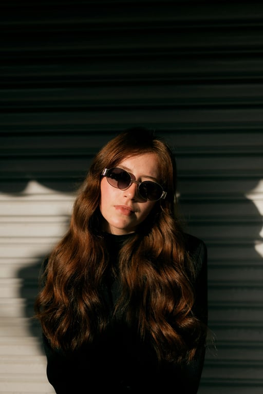 image to emoji converter before - a woman wearing sunglasses