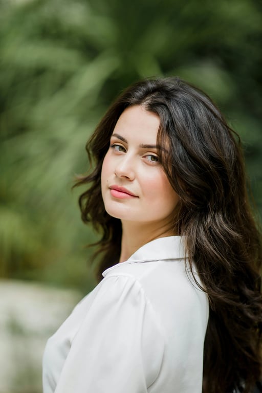 a portrait of a person transformed into a Jujutsu Kaisen–style anime artwork with clean linework, cool tones, and serious expression