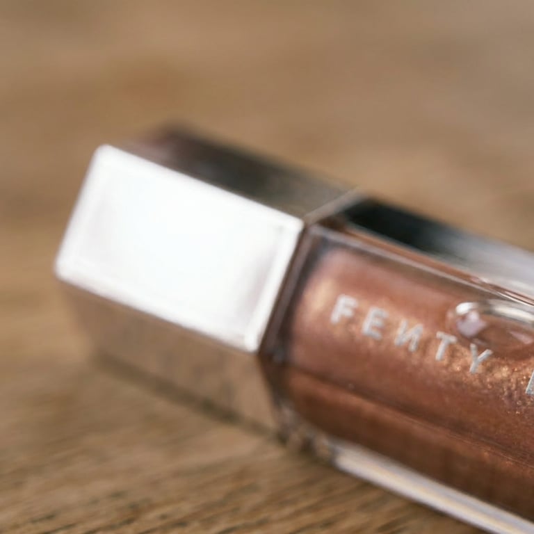 Create a close-up shot emphasizing the lipstick’s sheen, material details, and fine texture, highlighting surface quality and realistic reflections while maintaining the precise product design and original look.