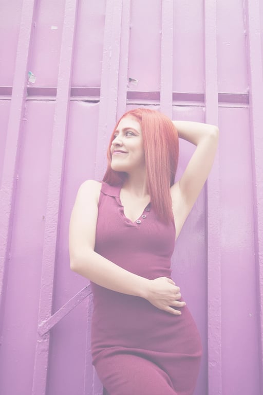 a portrait of a woman, soft light filter effect, dreamy glow, reduced contrast, pastel color tones, natural light background.