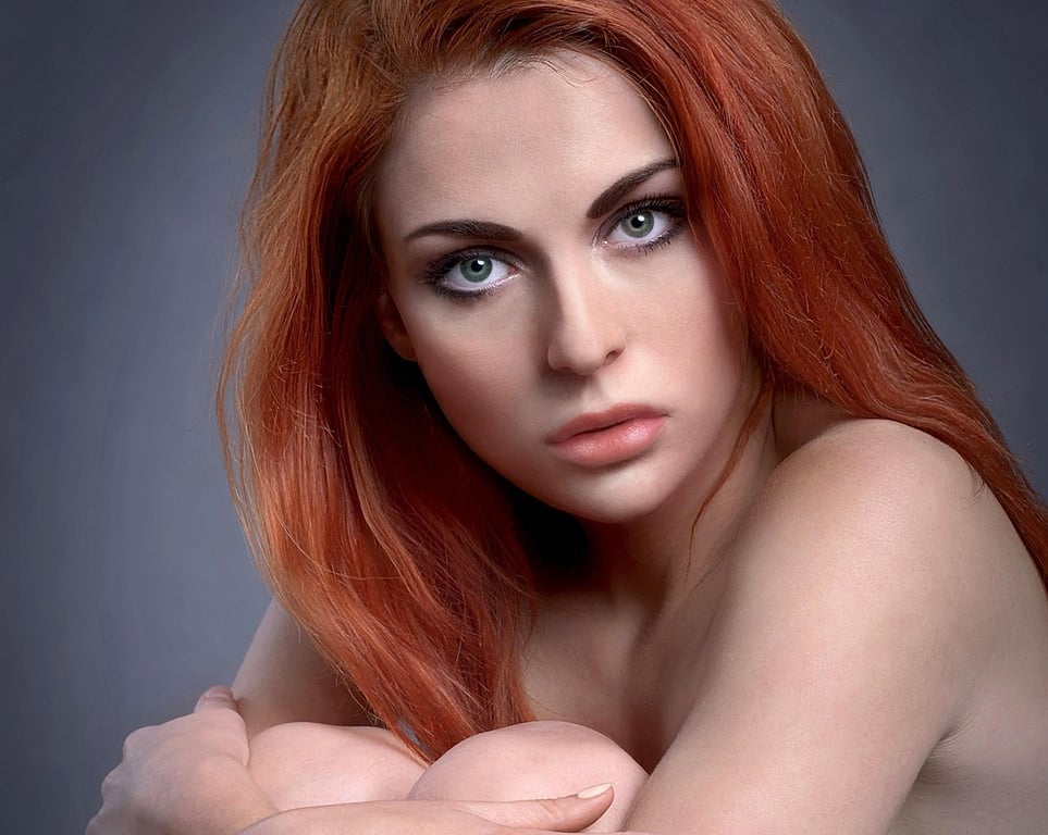 AI red eye remover after transformation - selfie with realistic eye color restored