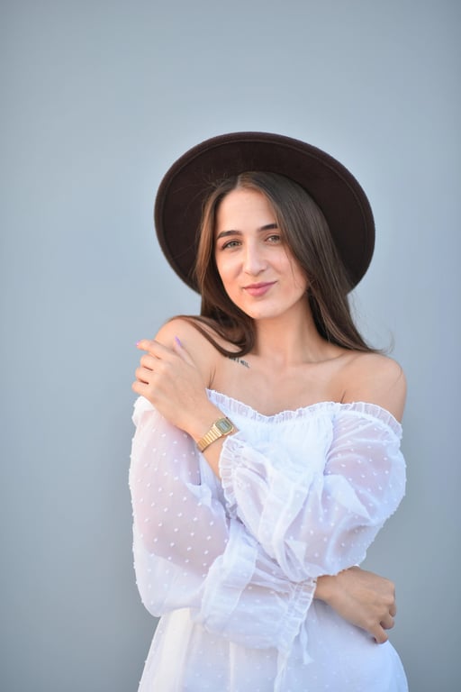 a portrait of a person transformed into a realistic T-shirt mockup with a simple logo-style design consisting of a small icon and short brand-like text beneath it, monochrome or two-color palette, clean vector-style edges, properly scaled to the chest area, and believable fabric behavior