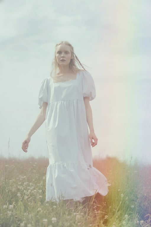 AI rainbow air filter after transformation - selfie with AI generated rainbow aura effect