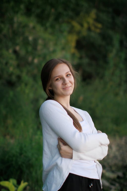 a portrait of a person edited to replace the original posture with a clearly more expressive and relaxed pose, such as standing tall with open shoulders or sitting with crossed legs and upright torso; maintain realistic anatomy; avoid stiffness; do not alter background