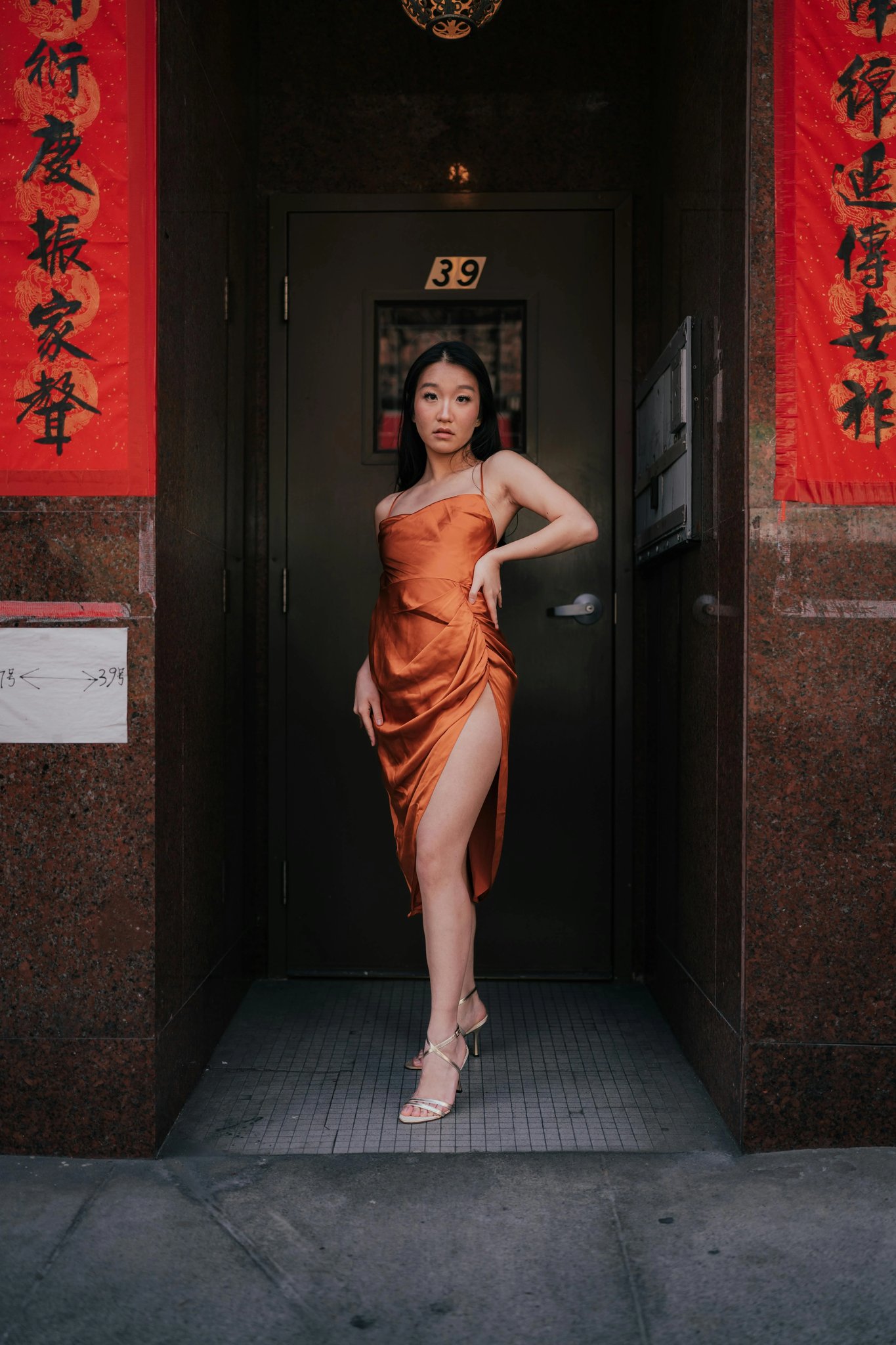 A symmetrical architectural shot or centered portrait.