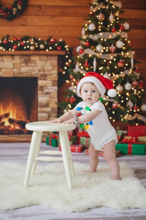 AI baby Christmas photo after photo - baby looking at the camera with Christmas decoration