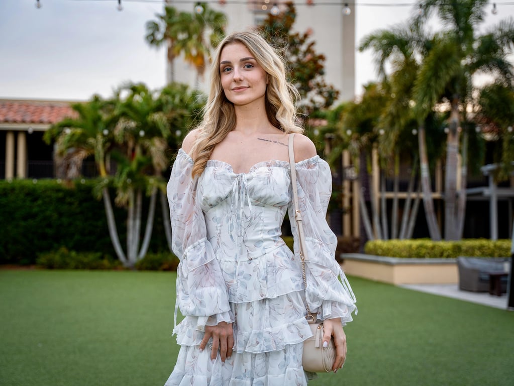 A photo of a person or object with a cluttered or busy background.