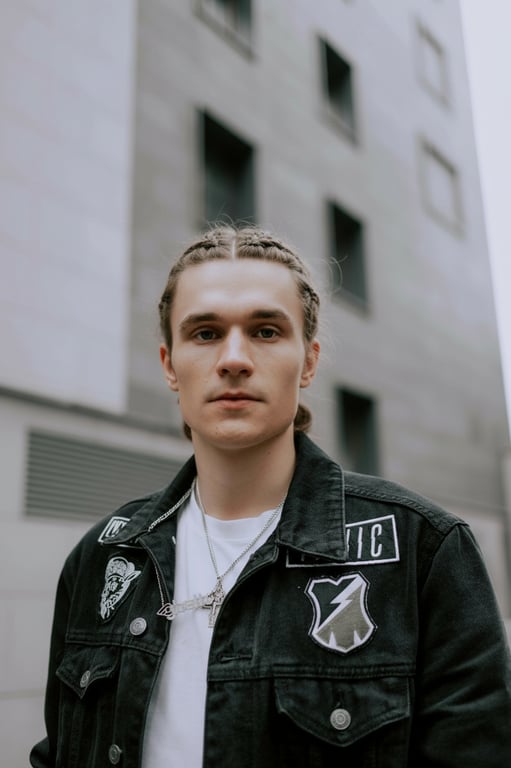 a classic braided hairstyle with symmetrical and tight braids, soft volume at the roots, smooth transitions, and natural hair texture blending seamlessly with the rest of the hair