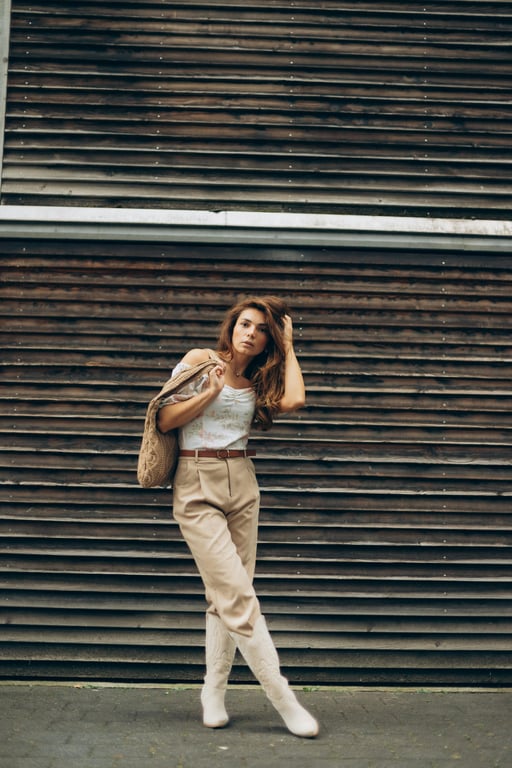 a portrait of a person stylized in a Marvel Rivals character aesthetic featuring modern game realism, expressive heroic features, high visual clarity, and energetic lighting