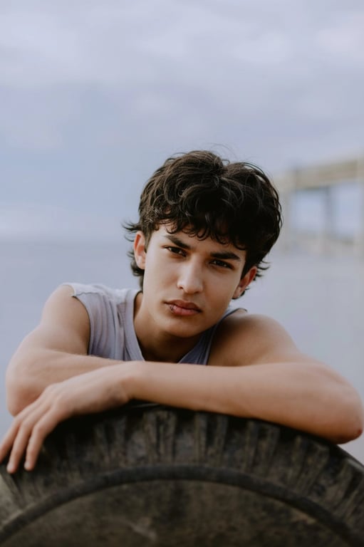 Wolf cut filter after pic – young man with layered wolf cut hairstyle and textured bangs