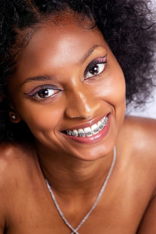 AI braces filter after transformation - professional headshot with subtle braces enhancement