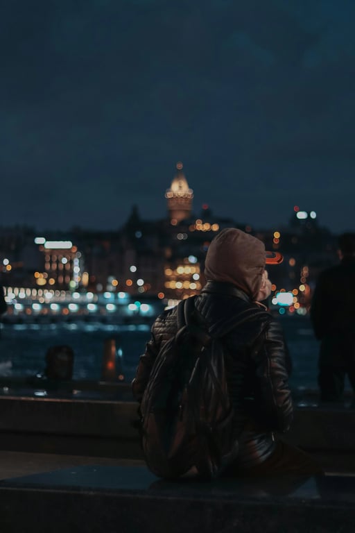 a portrait of a person transformed into a masked spider hero close-up, wearing a full spider mask with large white eye lenses, tight framing, strong contrast lighting, subtle comic shading, and a focused heroic expression conveyed through pose and lighting
