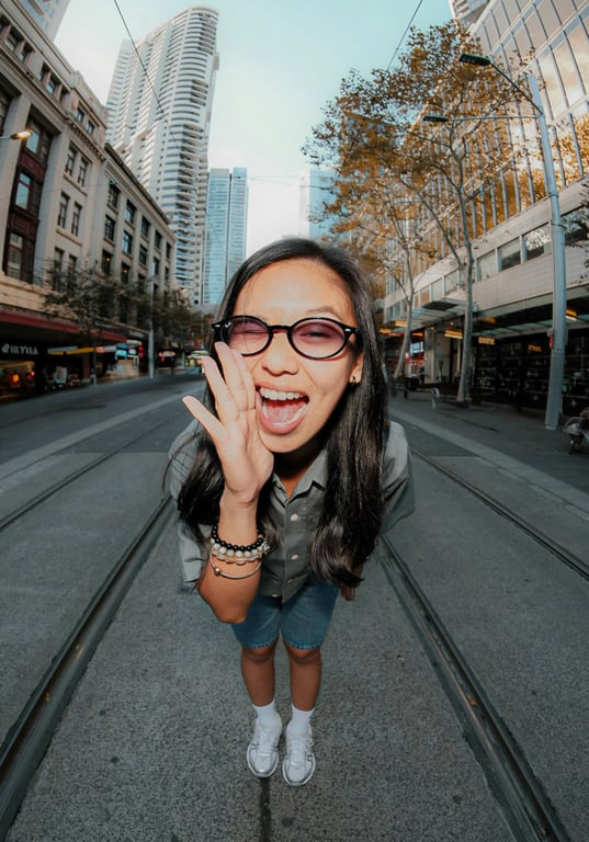 AI big eyes filter before photo - girl laughing outside
