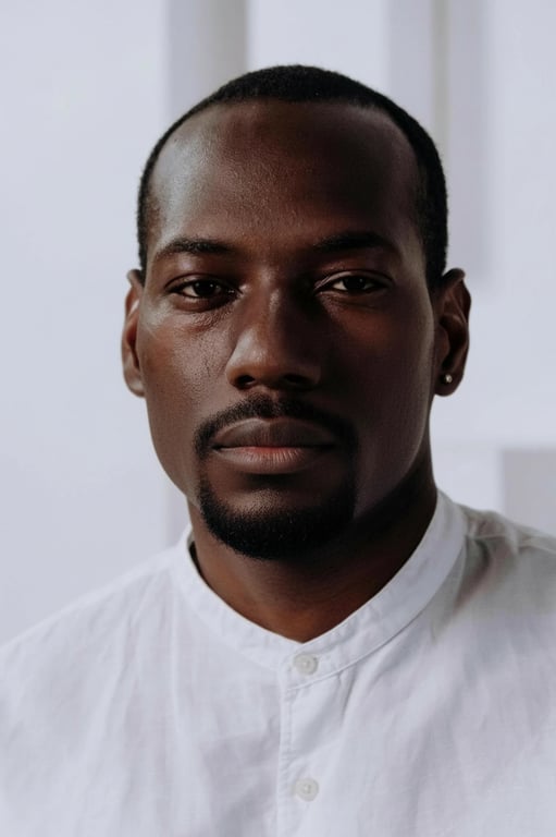a portrait with a sharp, angular modern goatee, precisely trimmed to create geometric lines and a clean, fashionable appearance