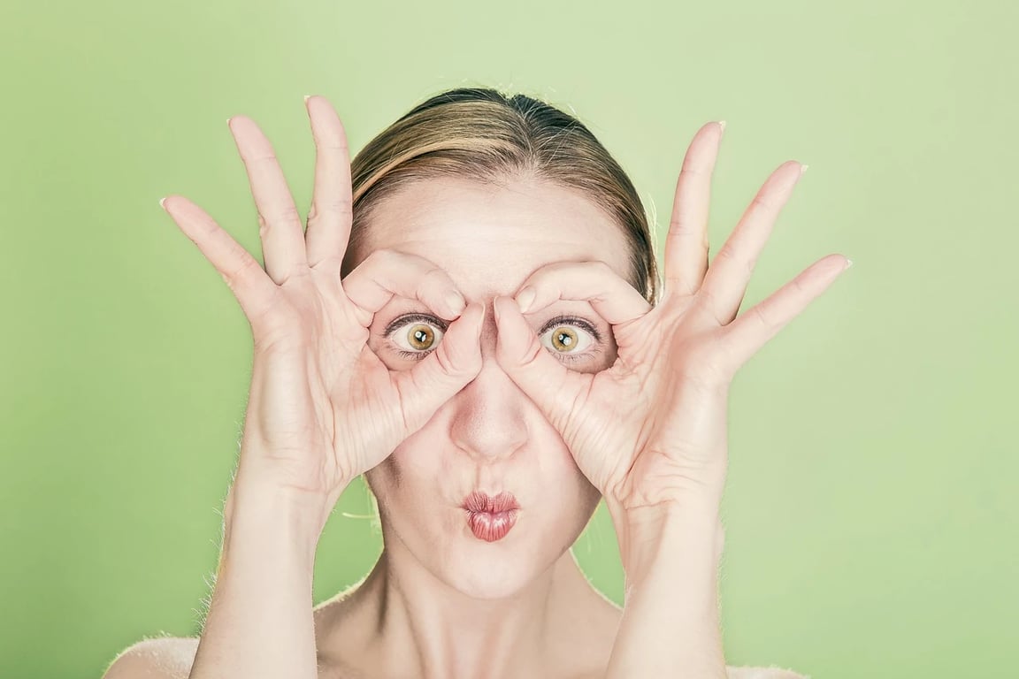 AI green screen remover before photo - young woman posing in front of green screen