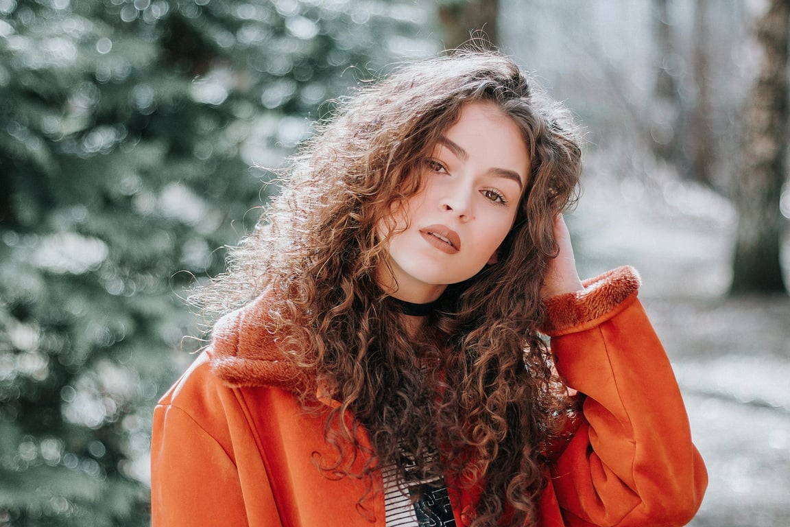AI long hair filter before photo - woman with curly hair