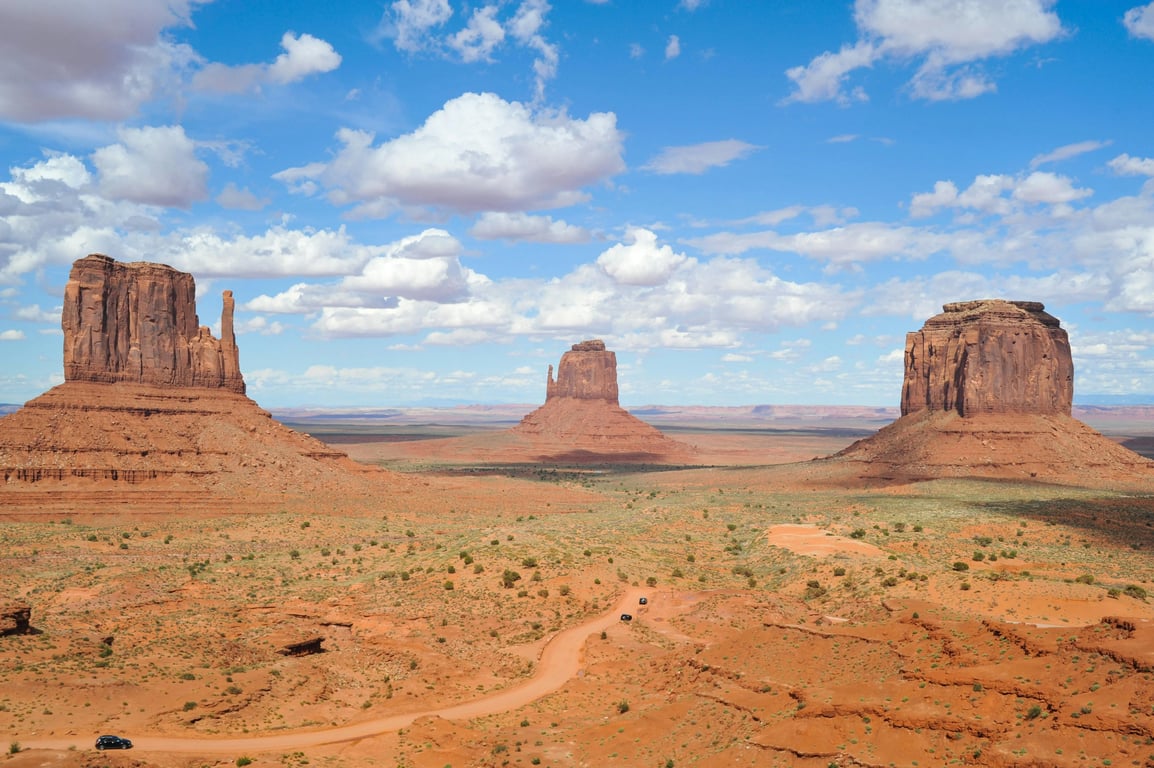 photo to watercolor before pic - desert rock formation under blue sky