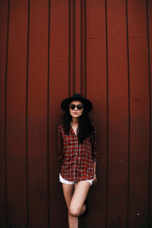 a portrait of a person edited to reshape the midsection into an extremely narrow waist while hips remain wide and stable, creating a dramatic and unmistakable waistline with a strong visual impact