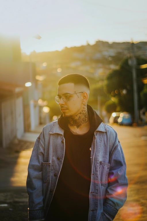 a portrait of a man edited in a Korean tidy short hairstyle style, so that the sides and back are cut very short close to the scalp following Korean barber techniques, while the top hair is short to medium length and straight, with no fringe, no curls or waves, and unchanged face and original lighting