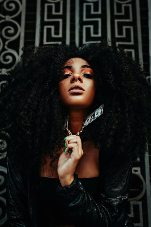 a portrait of a person edited to eliminate dark shadow areas on skin and fabric, restoring visibility while maintaining realistic contrast and detail