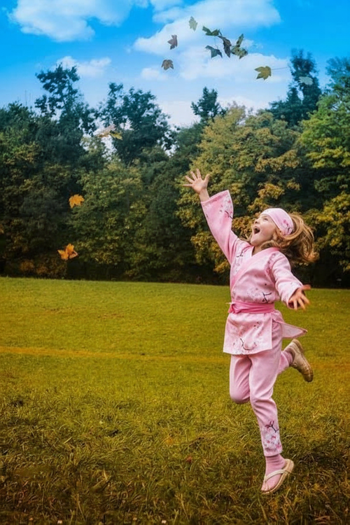 Kids ninja after – child in sakura ninja outfit with floral trims