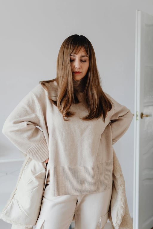 a portrait of a person edited with a patterned T-shirt design, featuring evenly spaced or intentionally arranged pattern elements, correct perspective wrapping across the torso, consistent scale, natural interaction with fabric wrinkles, preserved shirt texture, and balanced lighting