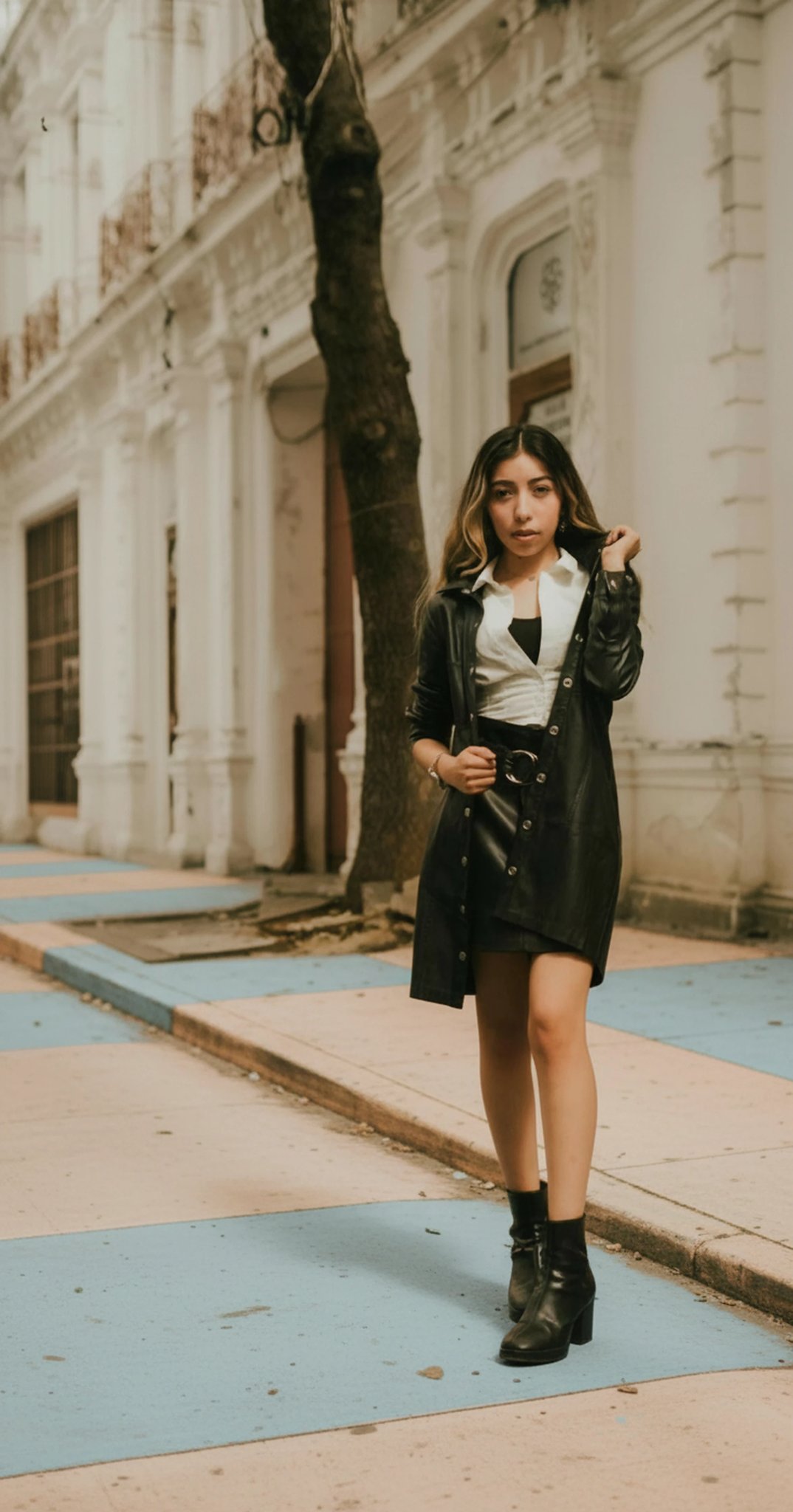 Urban photo edited to feature baby blue and pale peach buildings, creating a pastel city vibe.