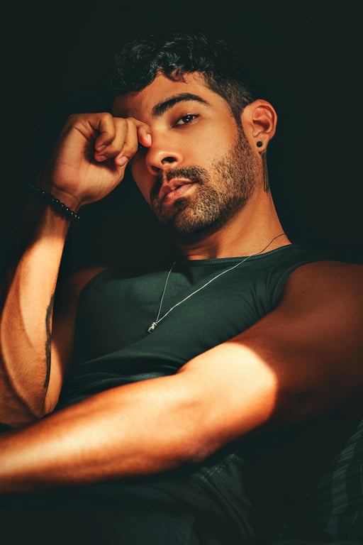 Extend the original portrait into a professional full-body image by reconstructing the lower body only. Preserve the same attire, background, and professional tone, and complete the stance with upright posture, balanced body proportions, and clean lighting continuity without introducing new styling elements.