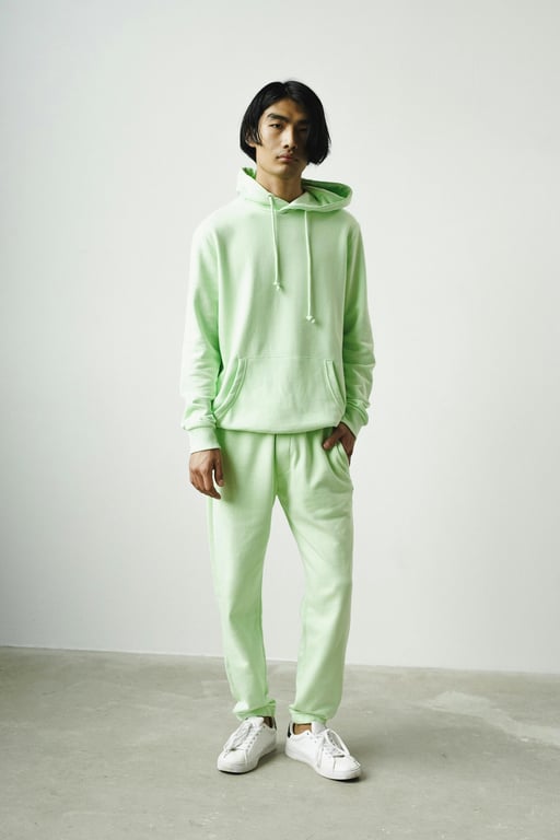 add suit to photo online free – before pic: man standing in casual pose with plain backdrop