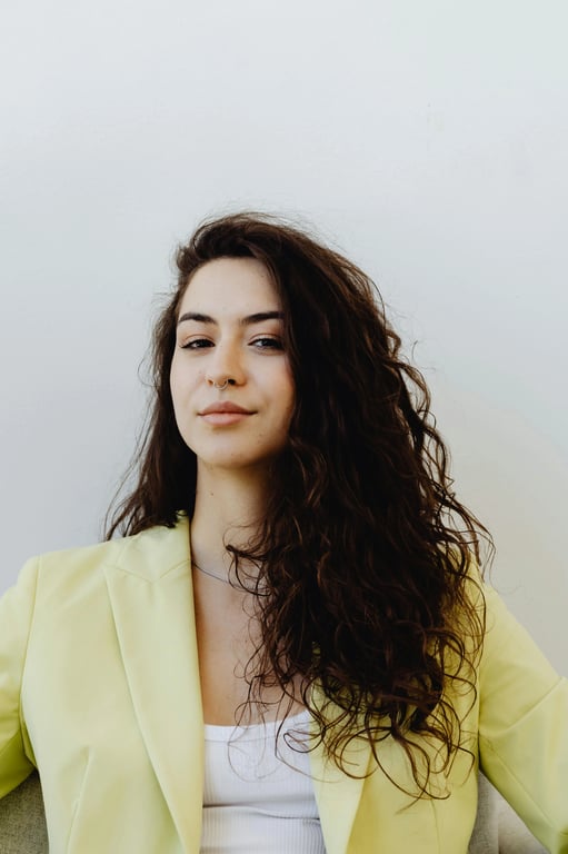 a portrait of a person transformed with low-angle sunset lighting, warm amber highlights, soft shadow falloff, and gentle glow around edges